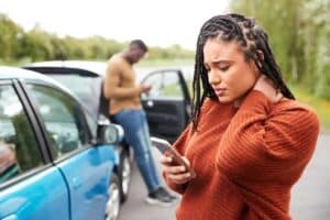 Auto accident victim calling a car accident Lawyer. Car accident lawyers, car accident attorney